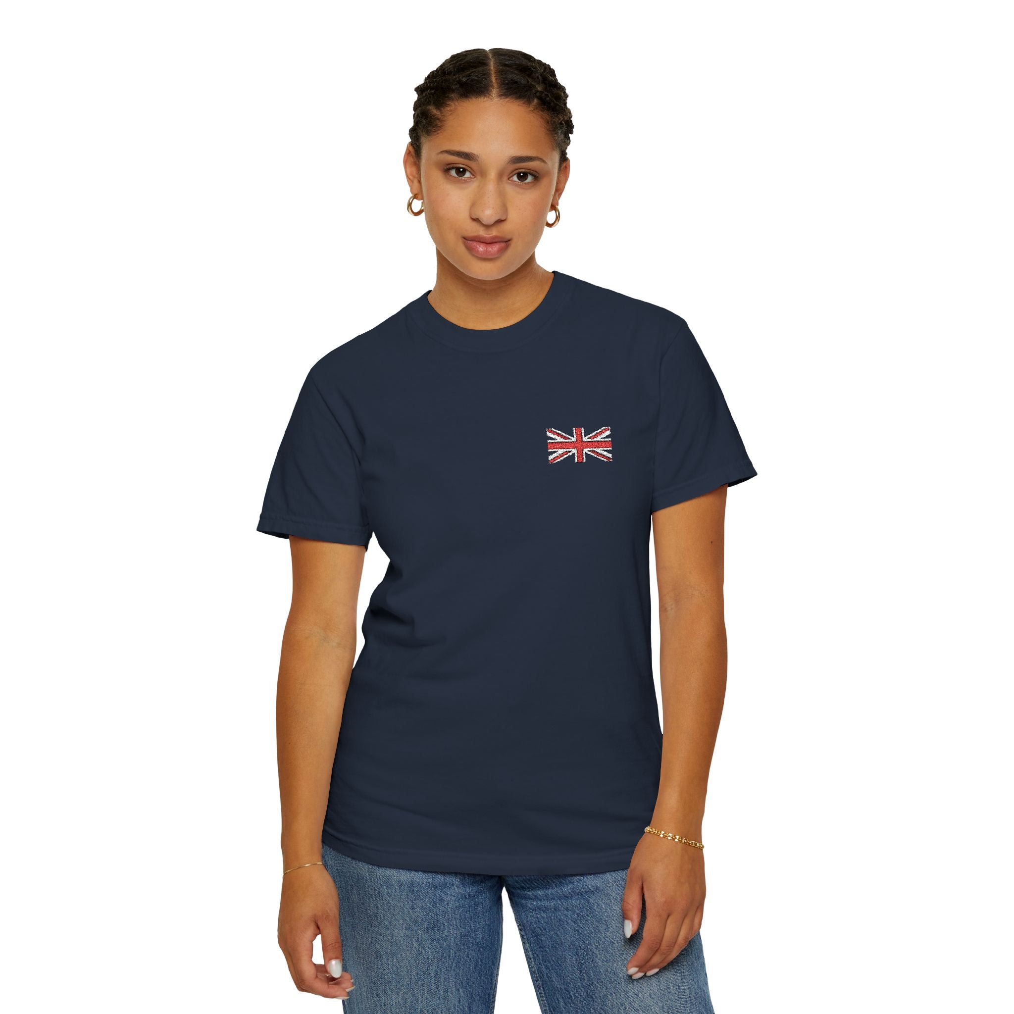 British Person wearing a navy blue t-shirt with a Union Jack design on a white background